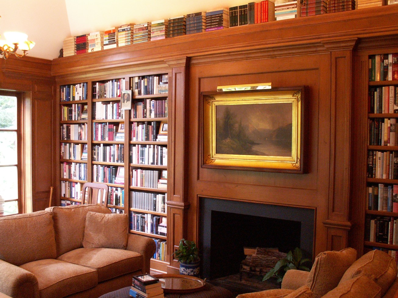 Shelves fill every available wall--- plenty of room for a treasured collection.